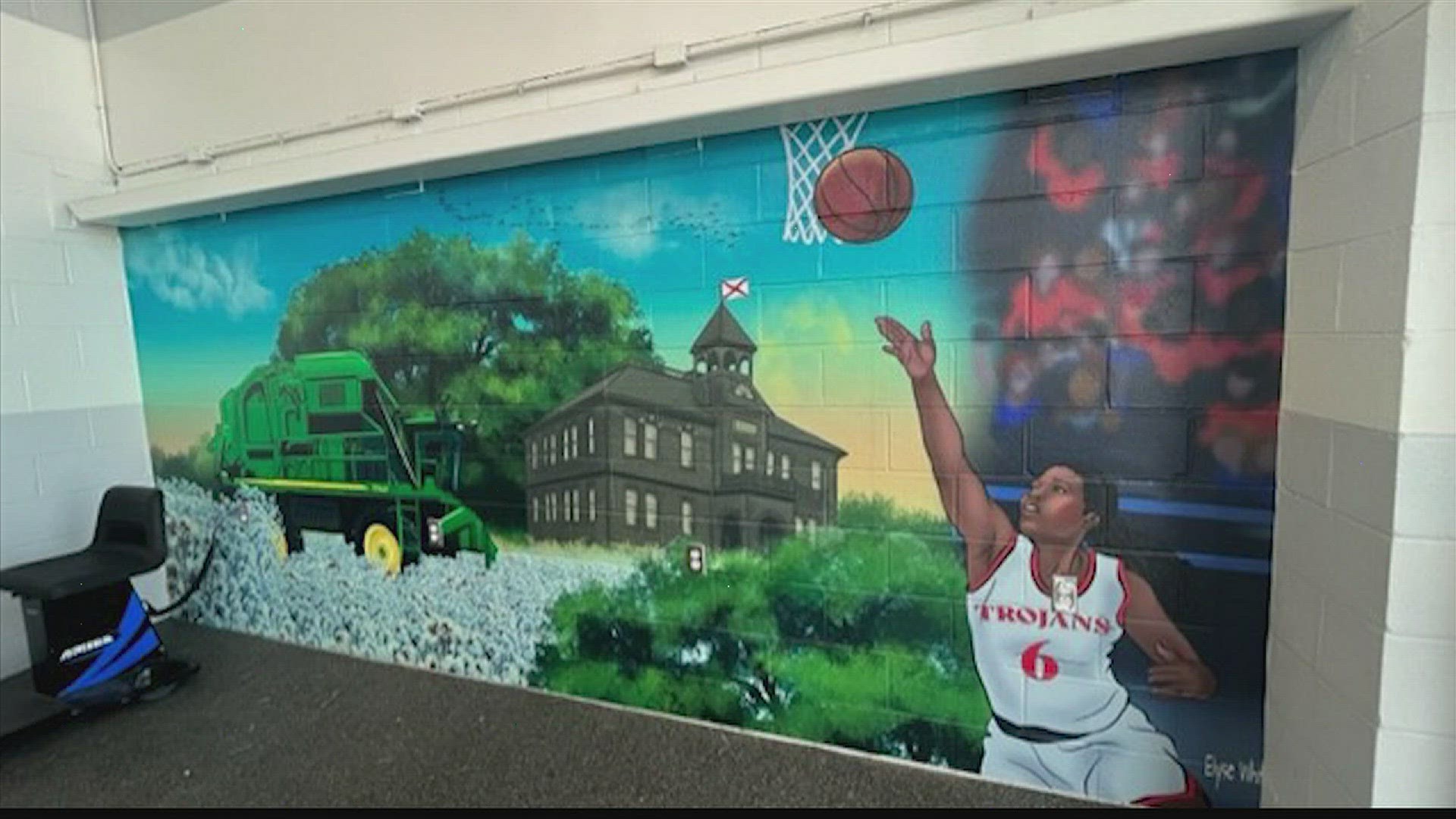 A mural at the Hazel Green, Alabama Walmart shows a historical schoolhouse - from Hazel Green, Wisconsin.