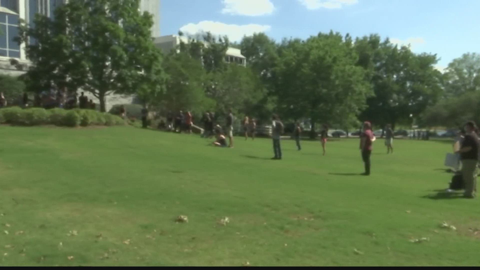 More than one hundred people attended the rally in Big Spring Park to stand against racial inequality.