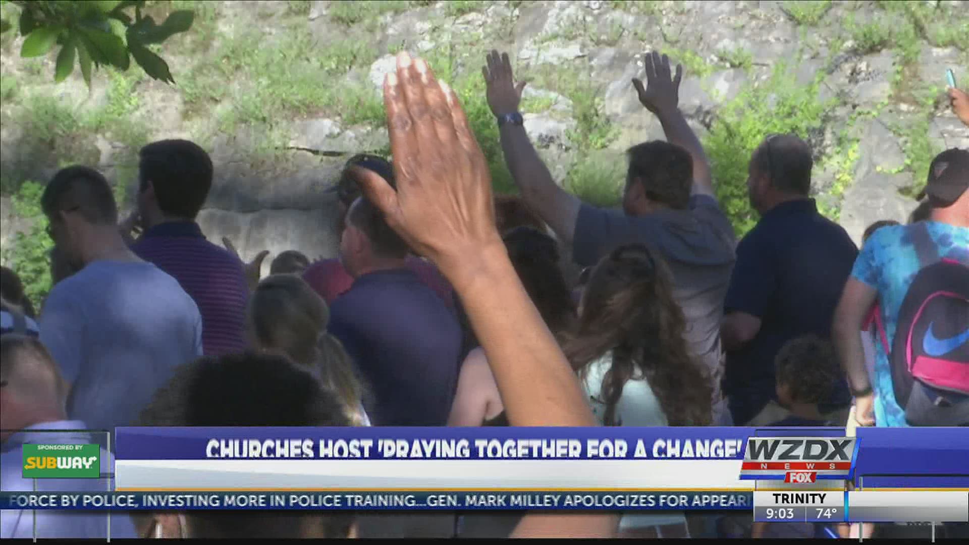Several local churches gathered at Big Spring Park East to pray for the community.