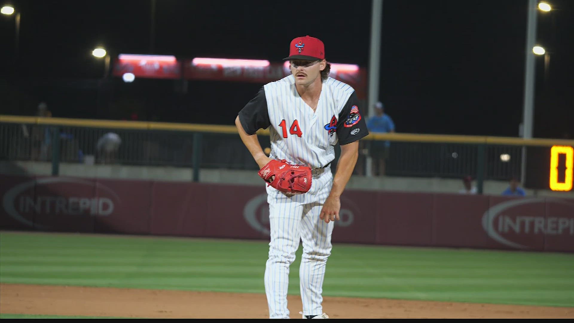 Which former Decatur High pitcher leading the MLB in ERA?