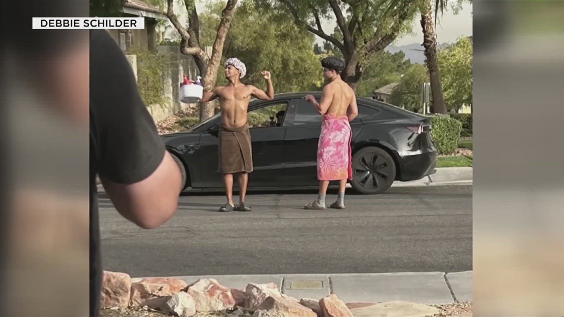 Residents suspect the pranksters clad in towels and bathing caps are trying to go viral but police and neighbors aren't really laughing.