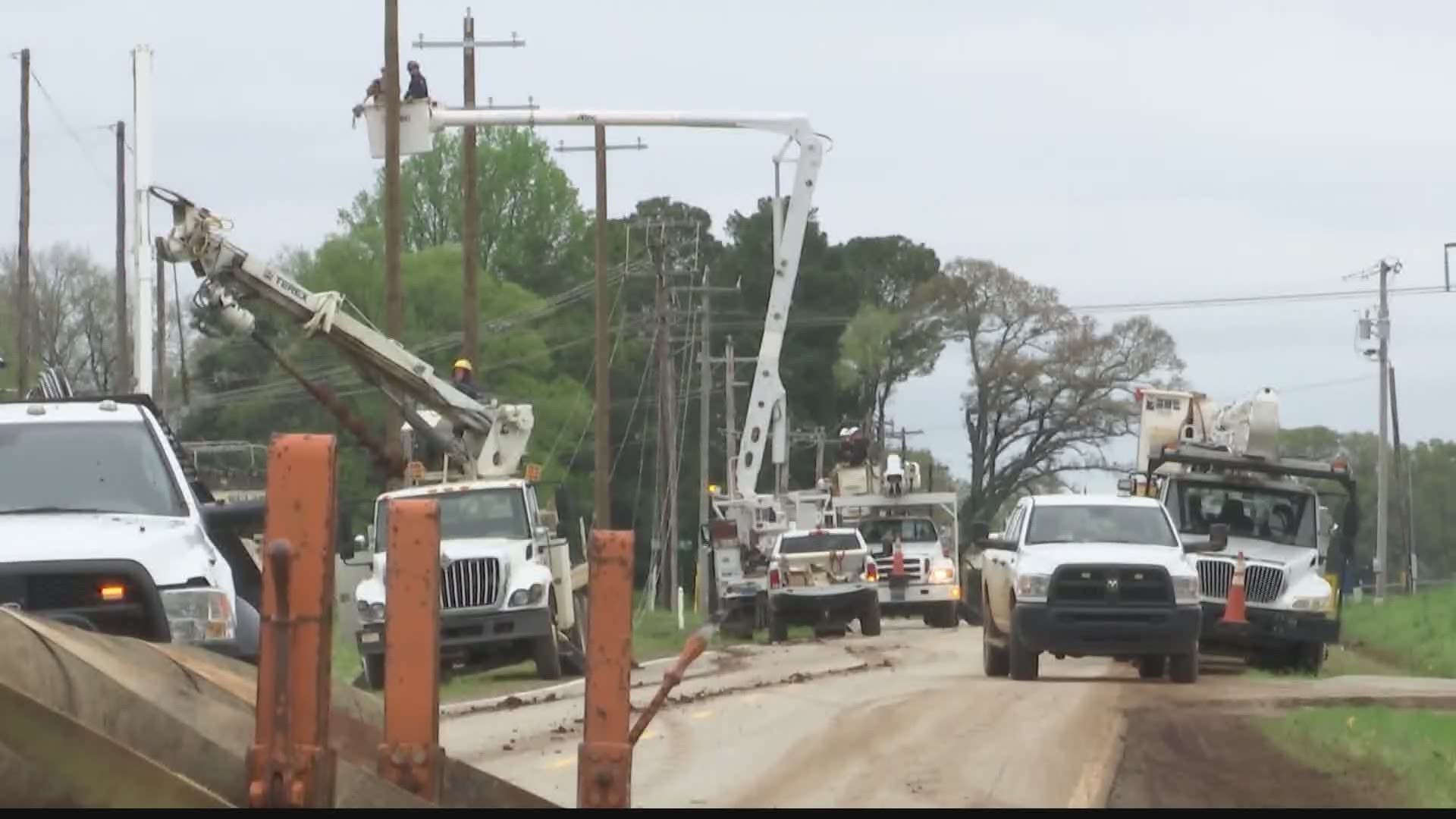 Athens Utilities workers spent the day replacing power poles in the Belle Mina area damaged by storms.