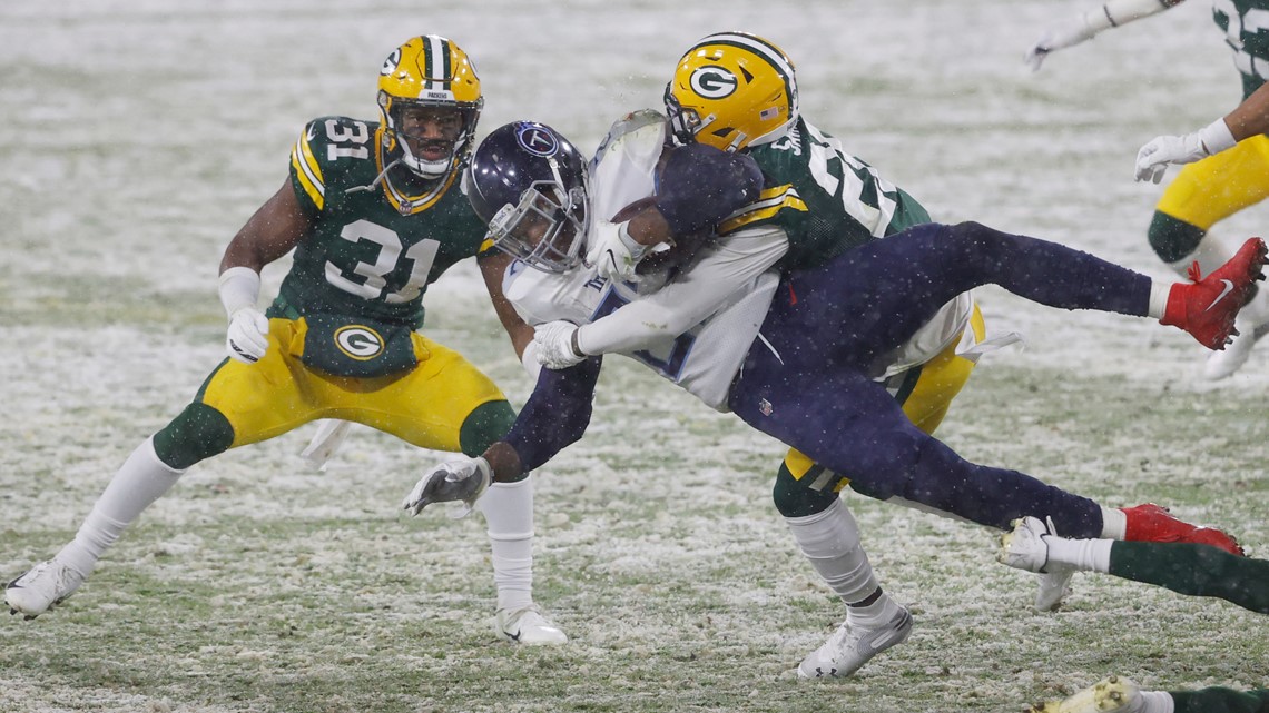 Aaron Rodgers, Davante Adams shine in snow as Packers crush Titans -  Chicago Sun-Times