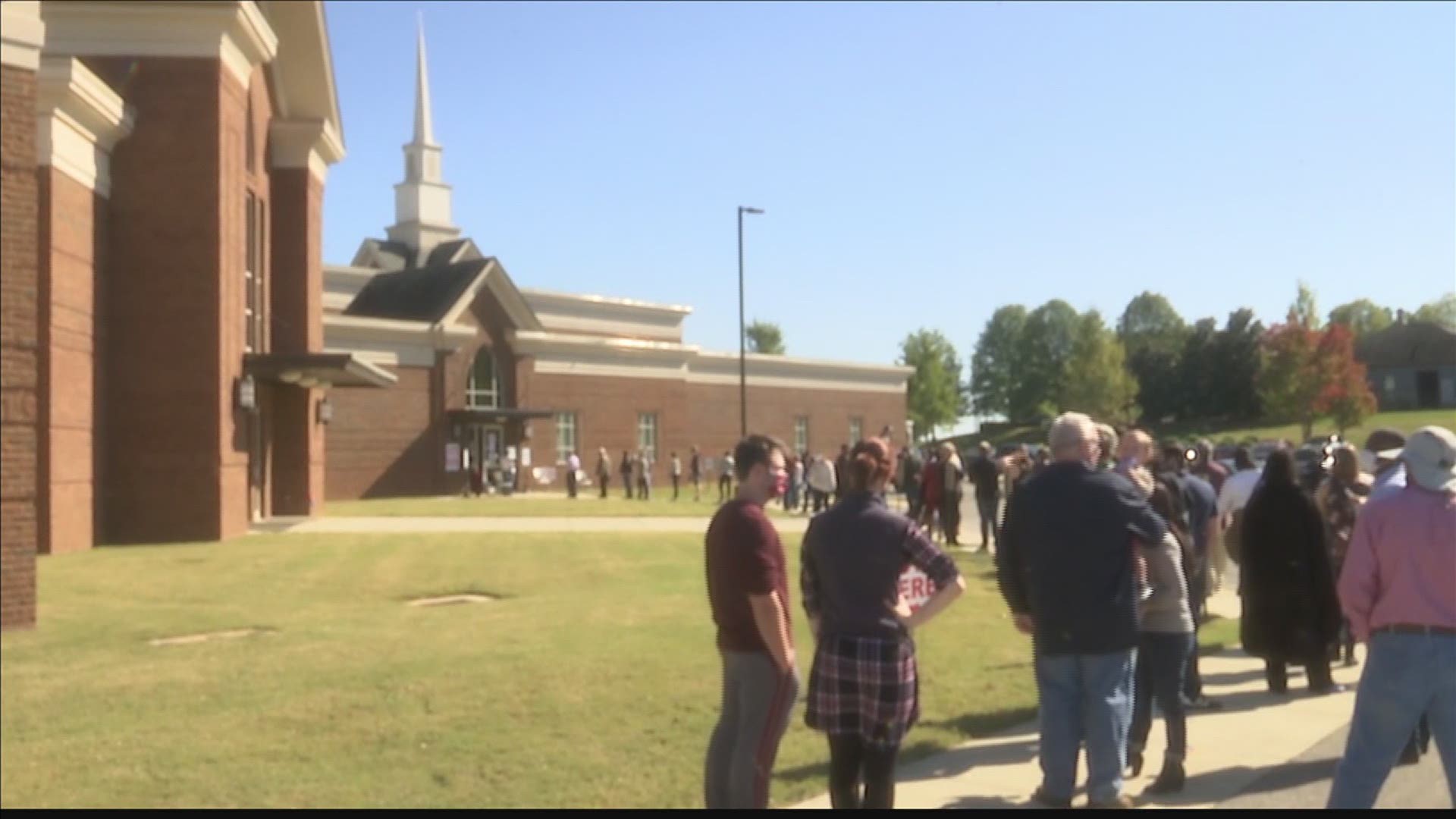 Voters at West Huntsville Church of Christ experience long wait times. They say at one point, the line was wrapped around the building four times.