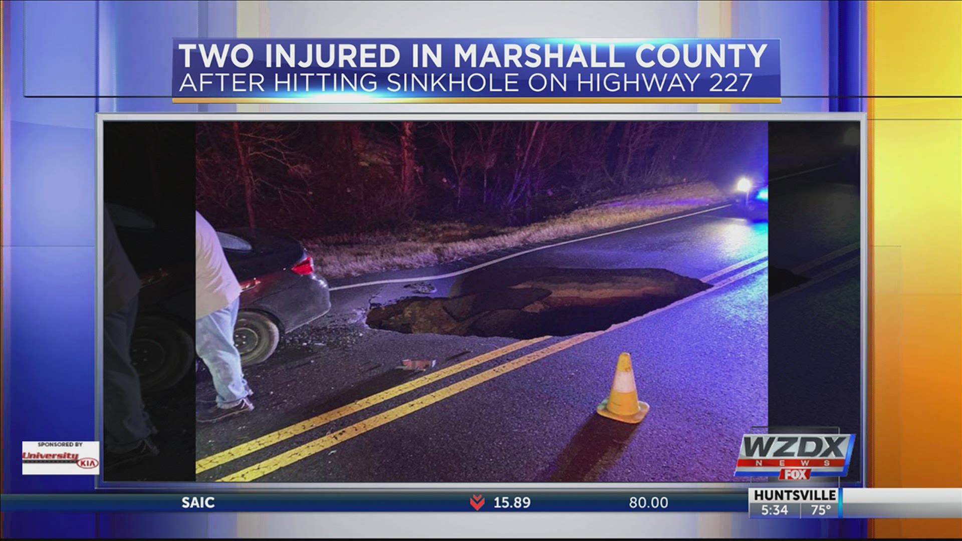 Two people were injured after their car hit a sinkhole in Morgan County after heavy rains.