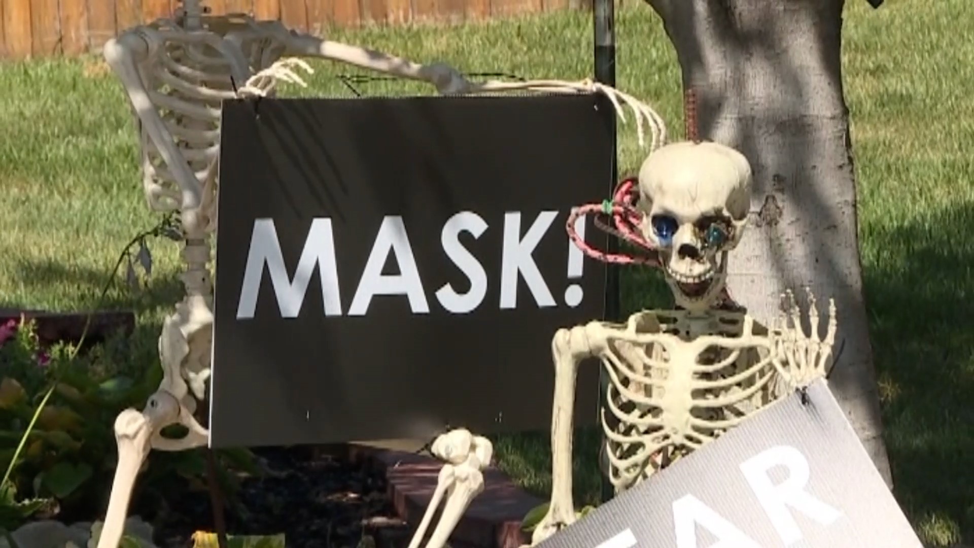 If you want to wear a costume mask, you can, but health officials say you must still wear a face covering under it.
