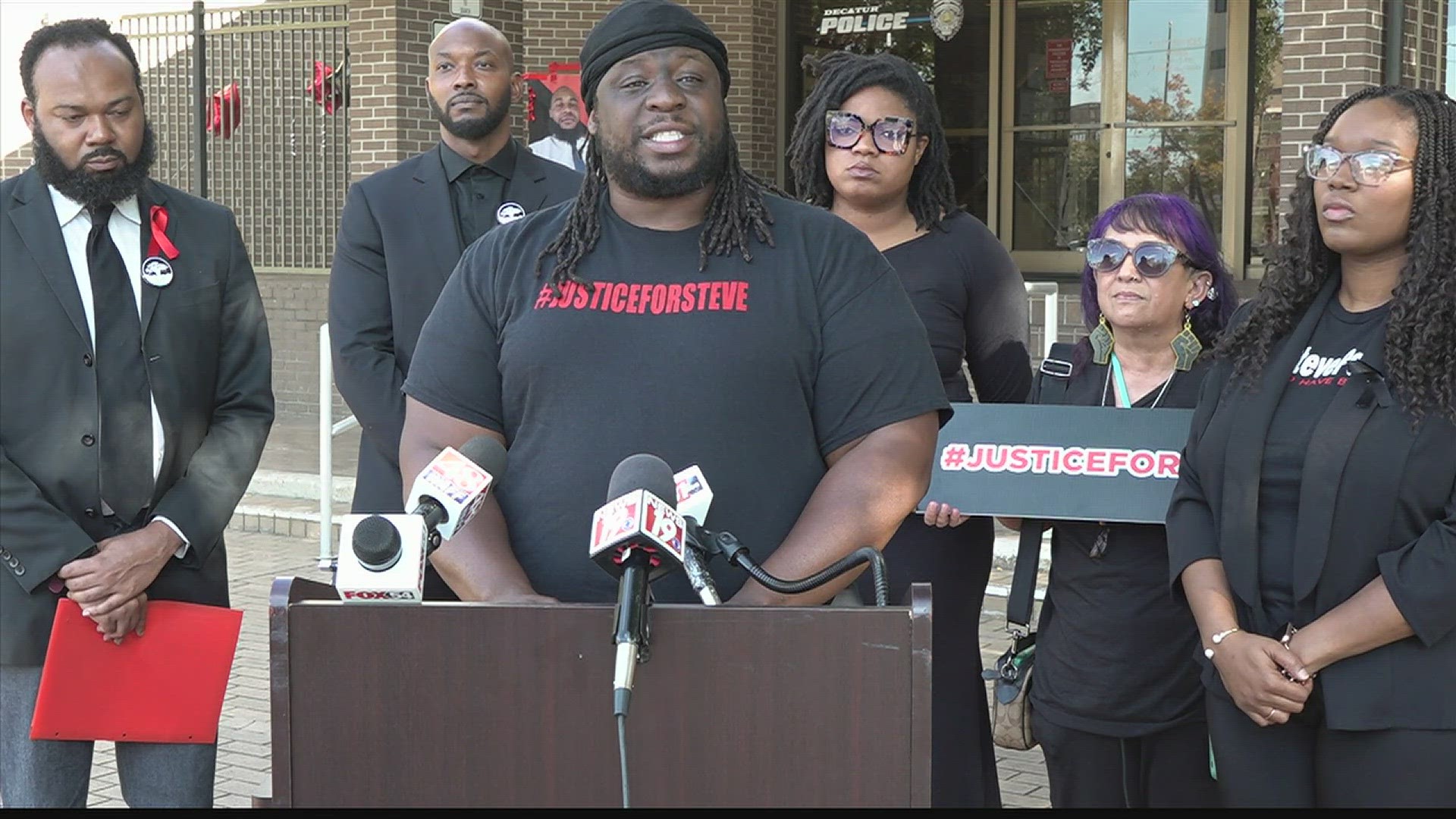 A racial justice group calls for transparency in the Decatur officer-involved shooting death of Steve Perkins and alleges false arrests in the search for answers.