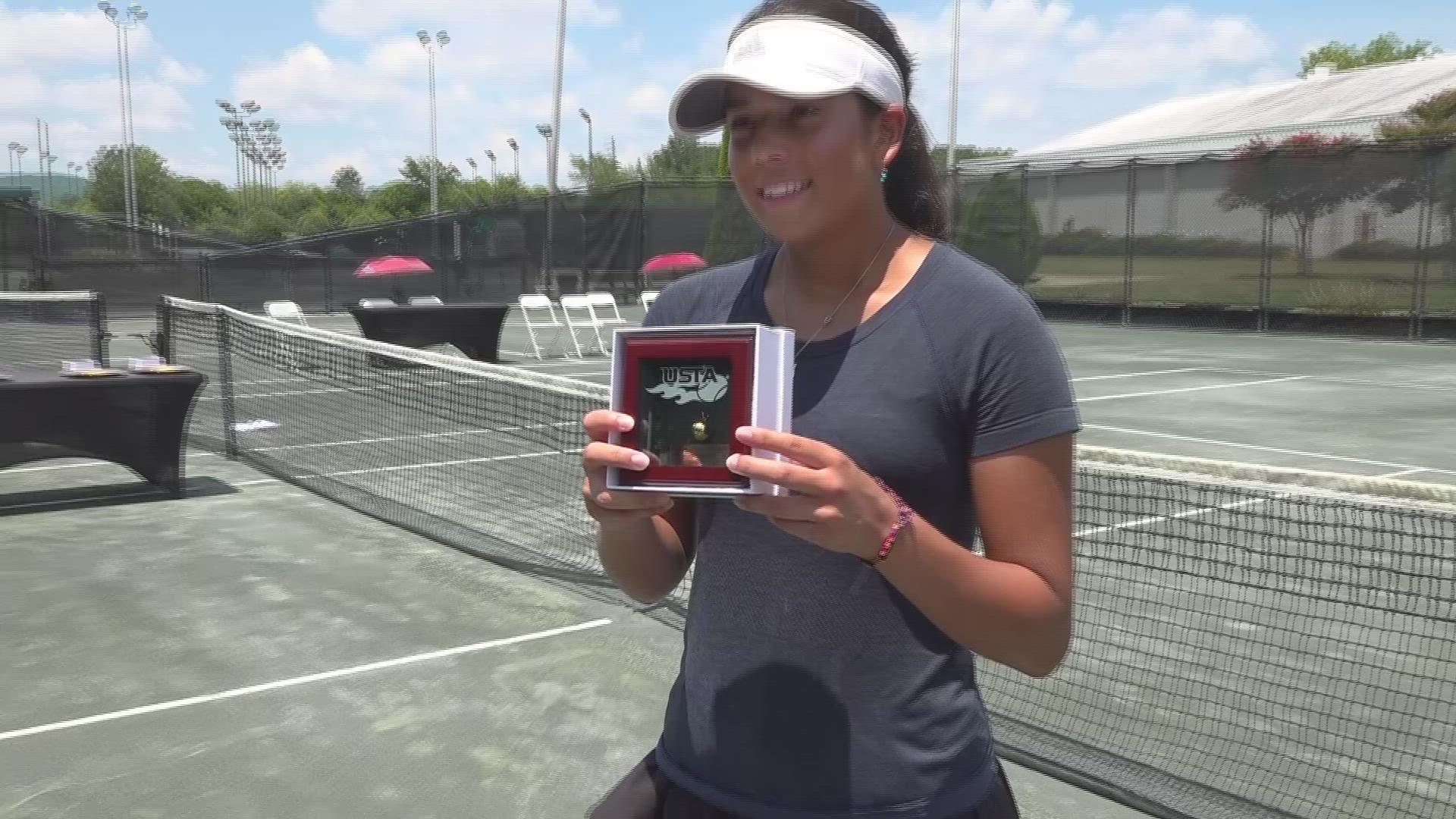 Top-3 player in California talks with local media after her win in clay court national championship finals.