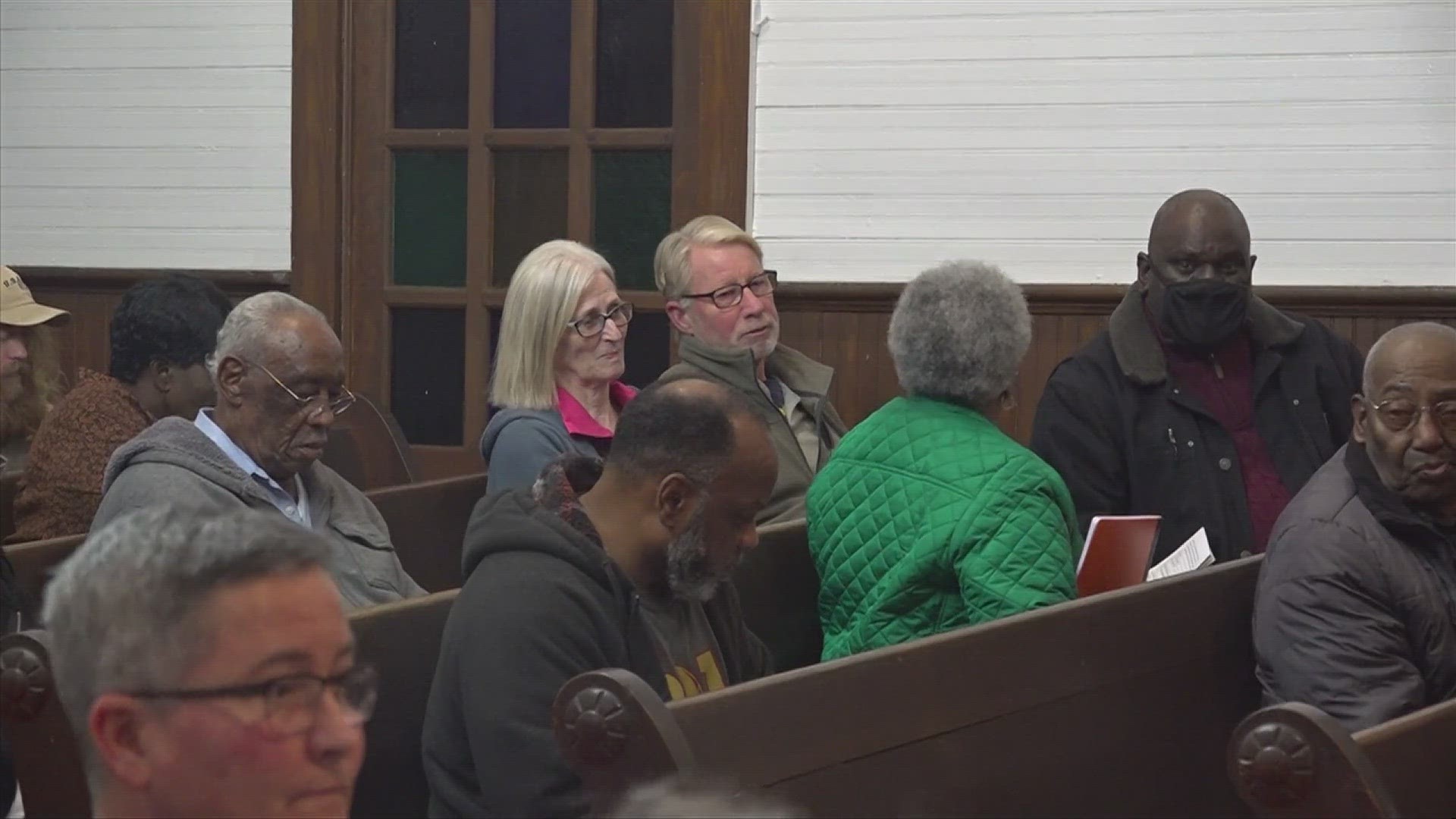 Commissioner Derrick Gatlin appears at a meeting of concerned citizens against a rock quarry project in their backyard.