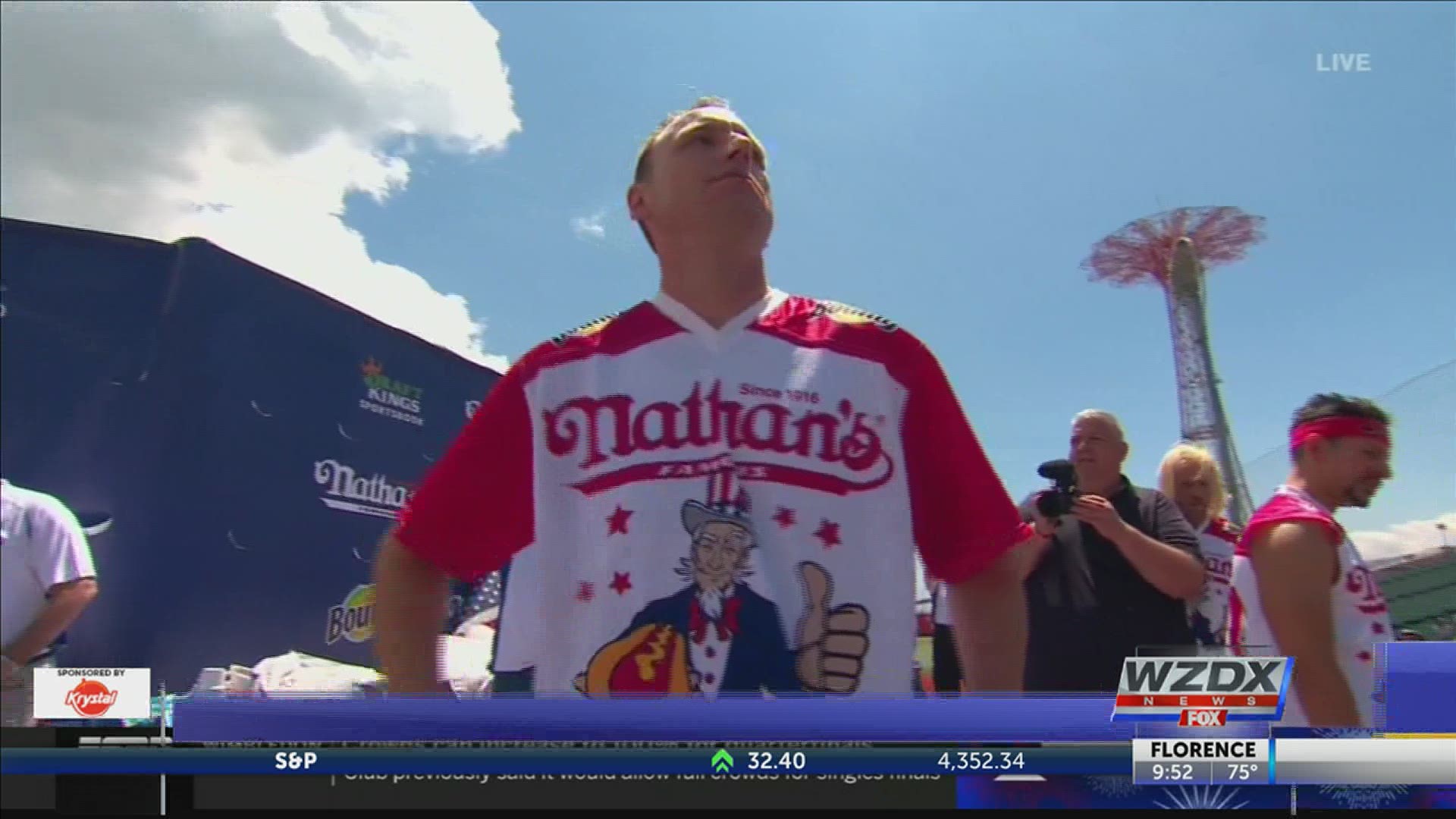 Chowdown champ Joey “Jaws” Chestnut broke his own record to gulp to a 14th win in the men’s Nathan’s Famous Hot Dog Eating Contest on Sunday