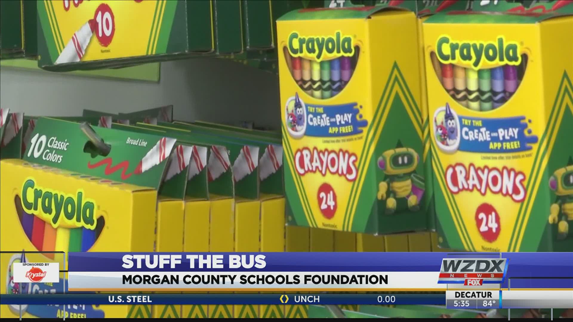 Stuff the Bus with school supplies for Morgan County Schools students.