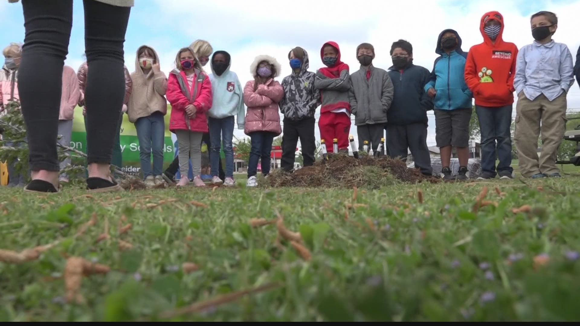 Trees were planted in early celebration of Earth Day at Hazel Green Elementary School, and students were able to throw in some dirt themselves.