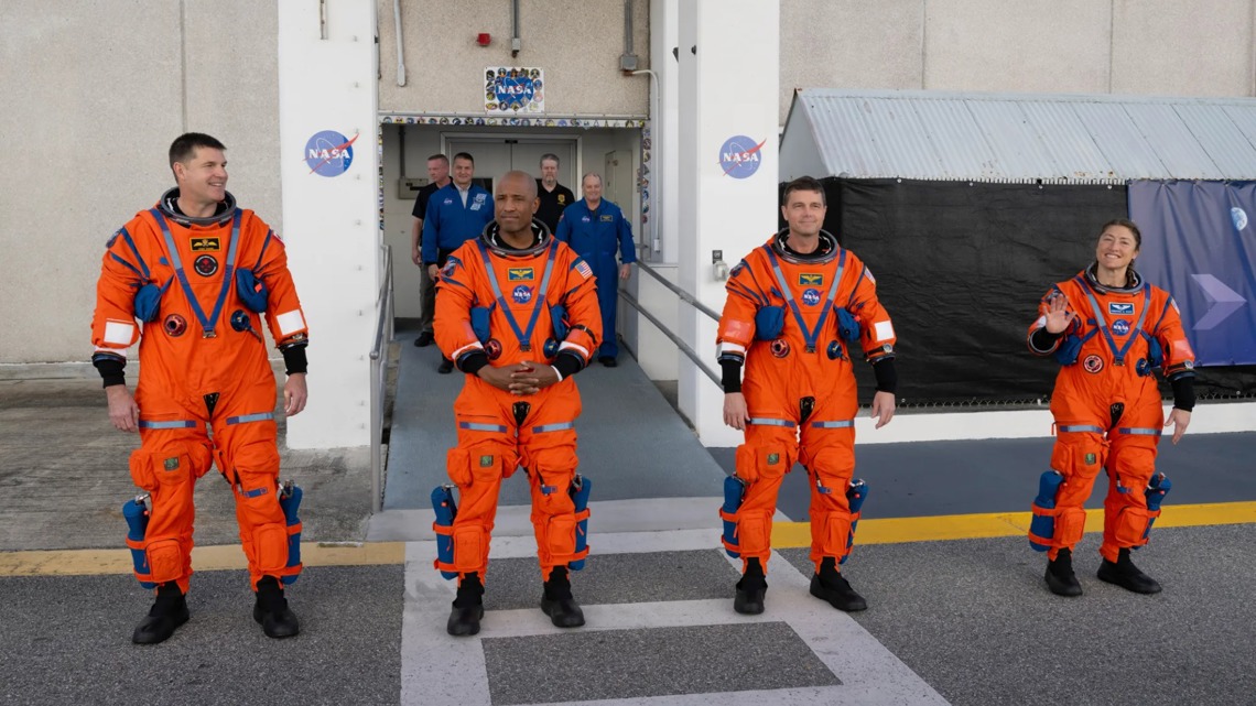 The astronauts set to fly around the Moon during NASA’s Artemis II test flight depart the Neil A. Armstrong Operations and Checkout Building at KSC.