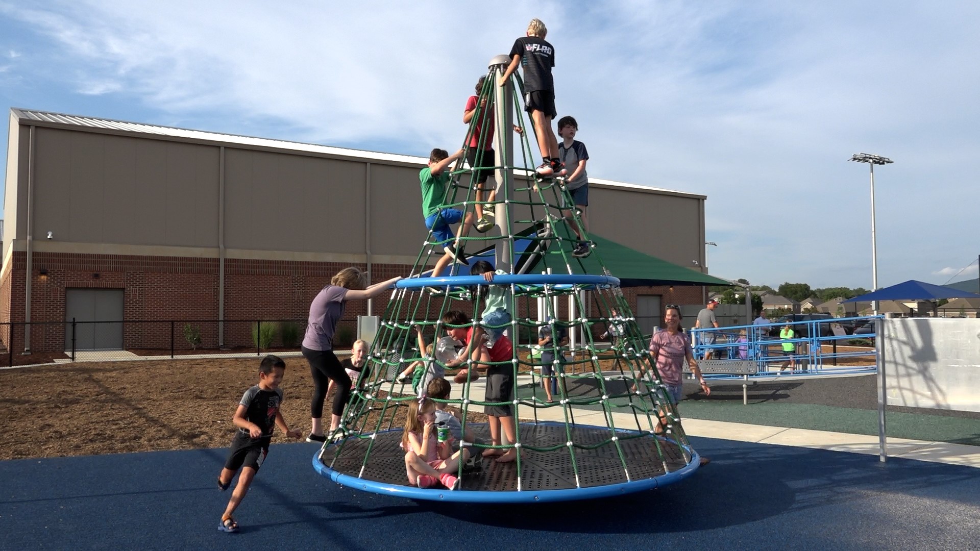 The first universal playground of its kind in Madison County and second universal playground in the state receives an inclusive zipline and rotating robe climber.