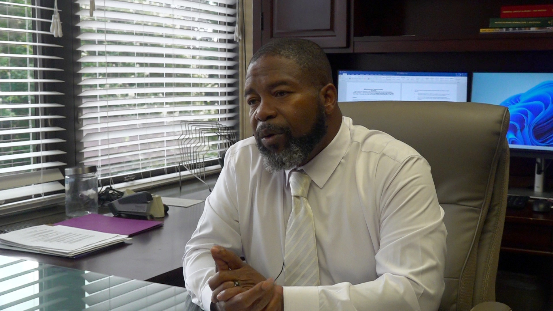 Nadis Carlisle Jr. ends his interim police chief role to ensure new chief Tory Mack leads without pressure.