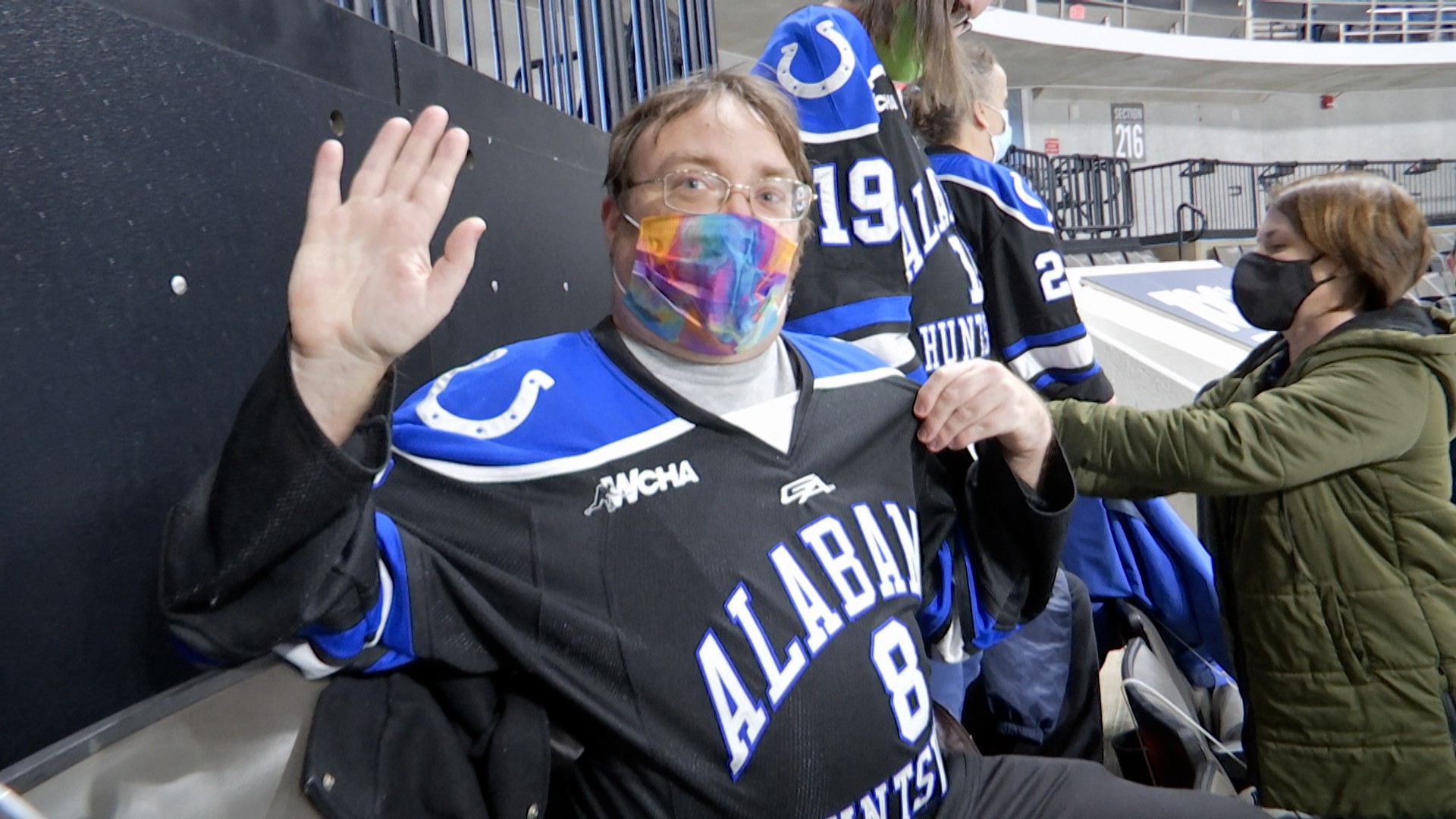 Residents at 305 8th Street, a group home for adults with special needs, were surprised with UAH Men's Hockey season tickets.