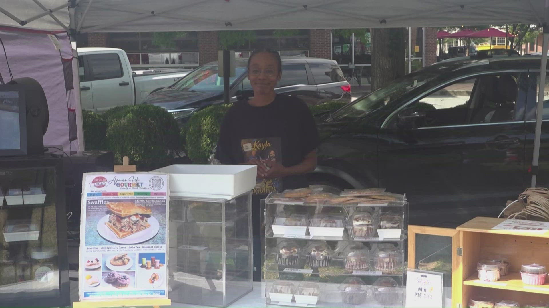 Shoppers looking for fresh local foods at the Villages of Providence Farmers Market brought school supplies along with their market bags.