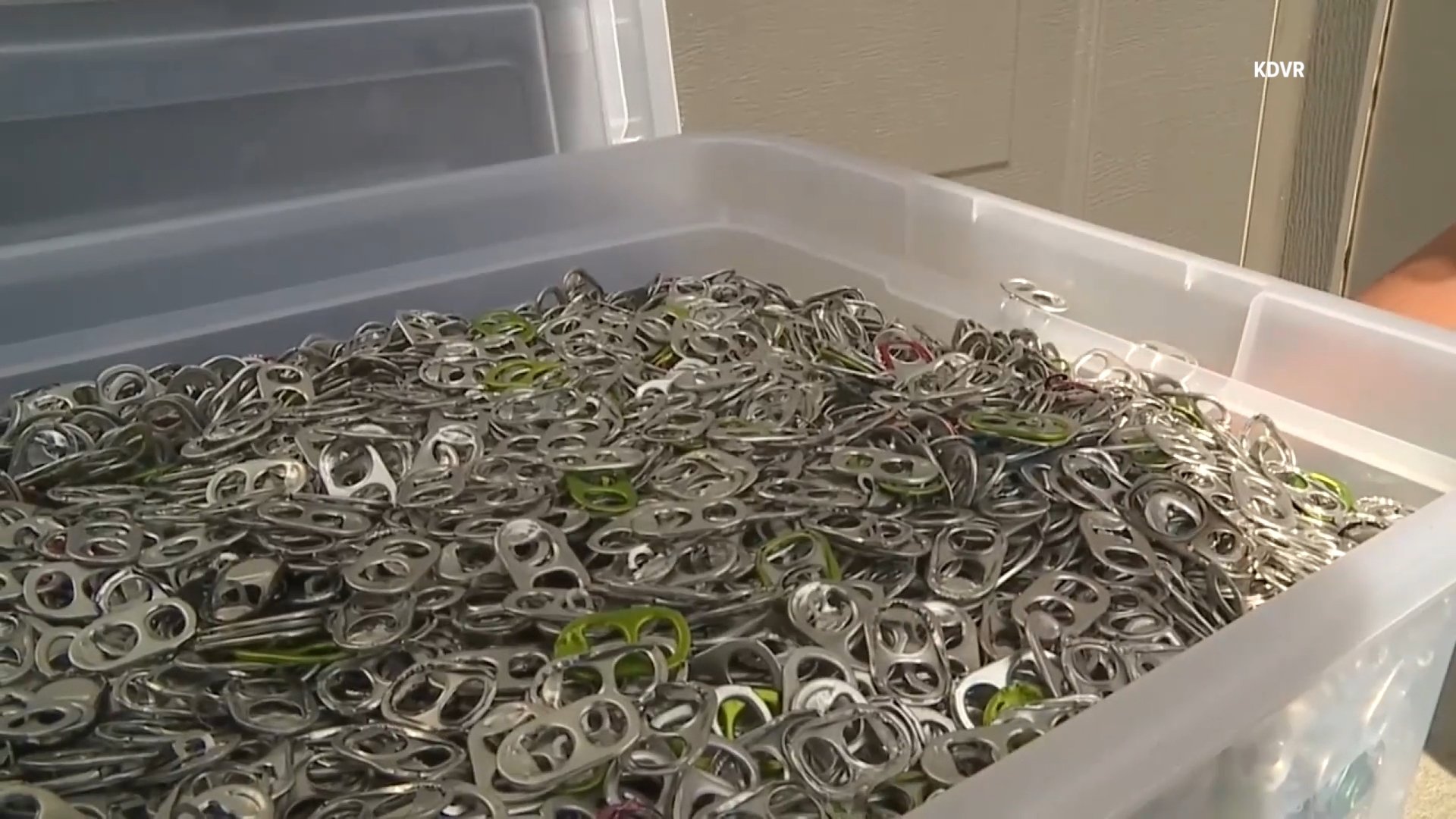 A Colorado boy collected more than 100,000 soda can tabs and converted them to cash to turn over to his local Ronald McDonald House.