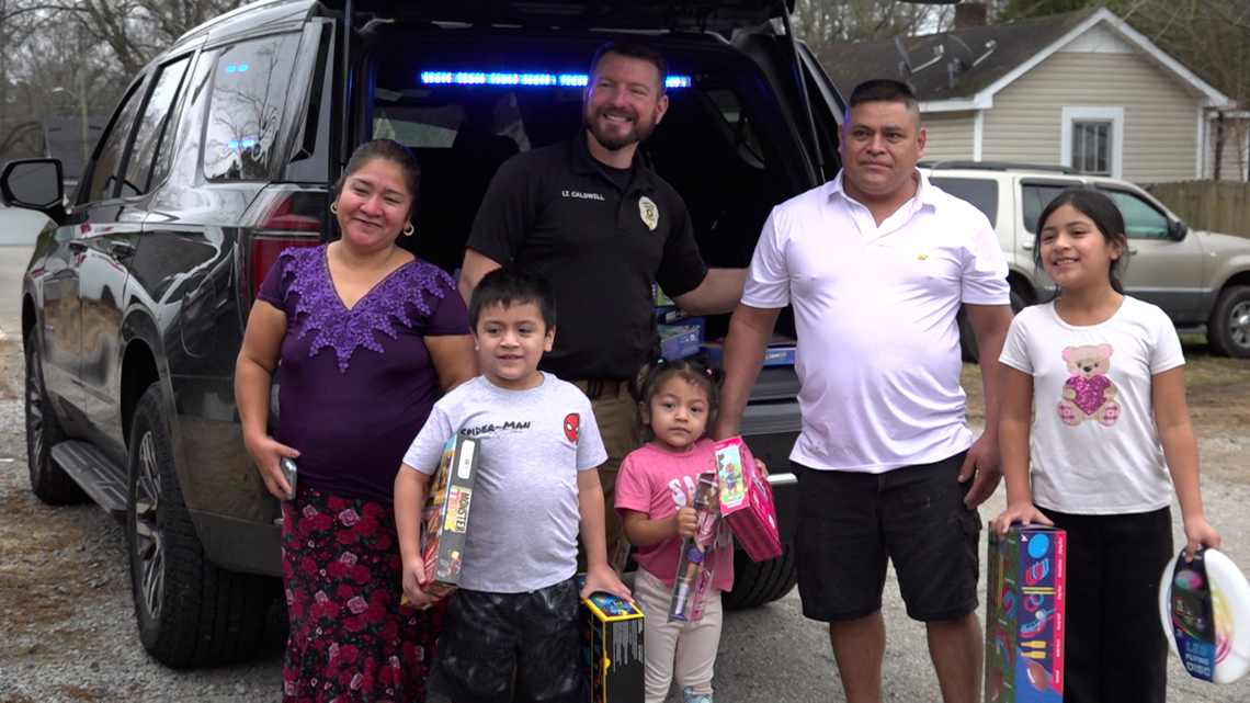 Athens police trade tickets for toys in Christmas morning giveaway