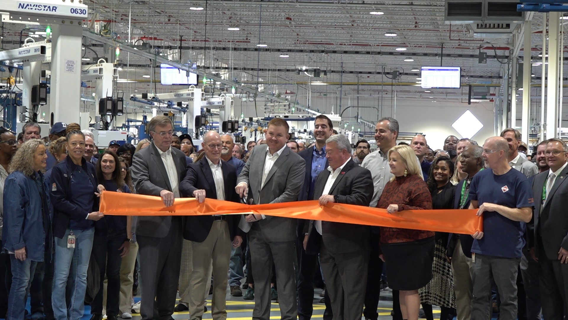 Navistar ribbon cutting for the expanison of its power train production plant.
