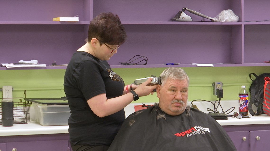 Volunteers give free haircuts to Huntsville's homeless