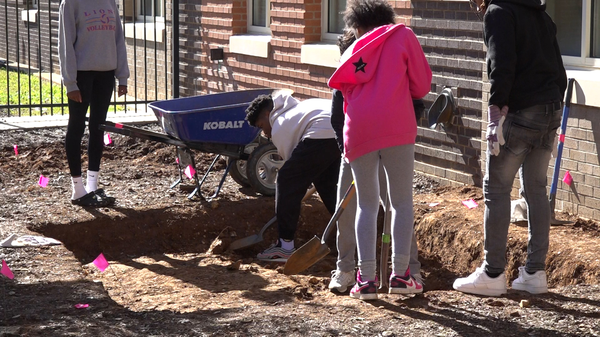 The 'living laboratory' will include learning stations and is being built by students, staff, and parents.