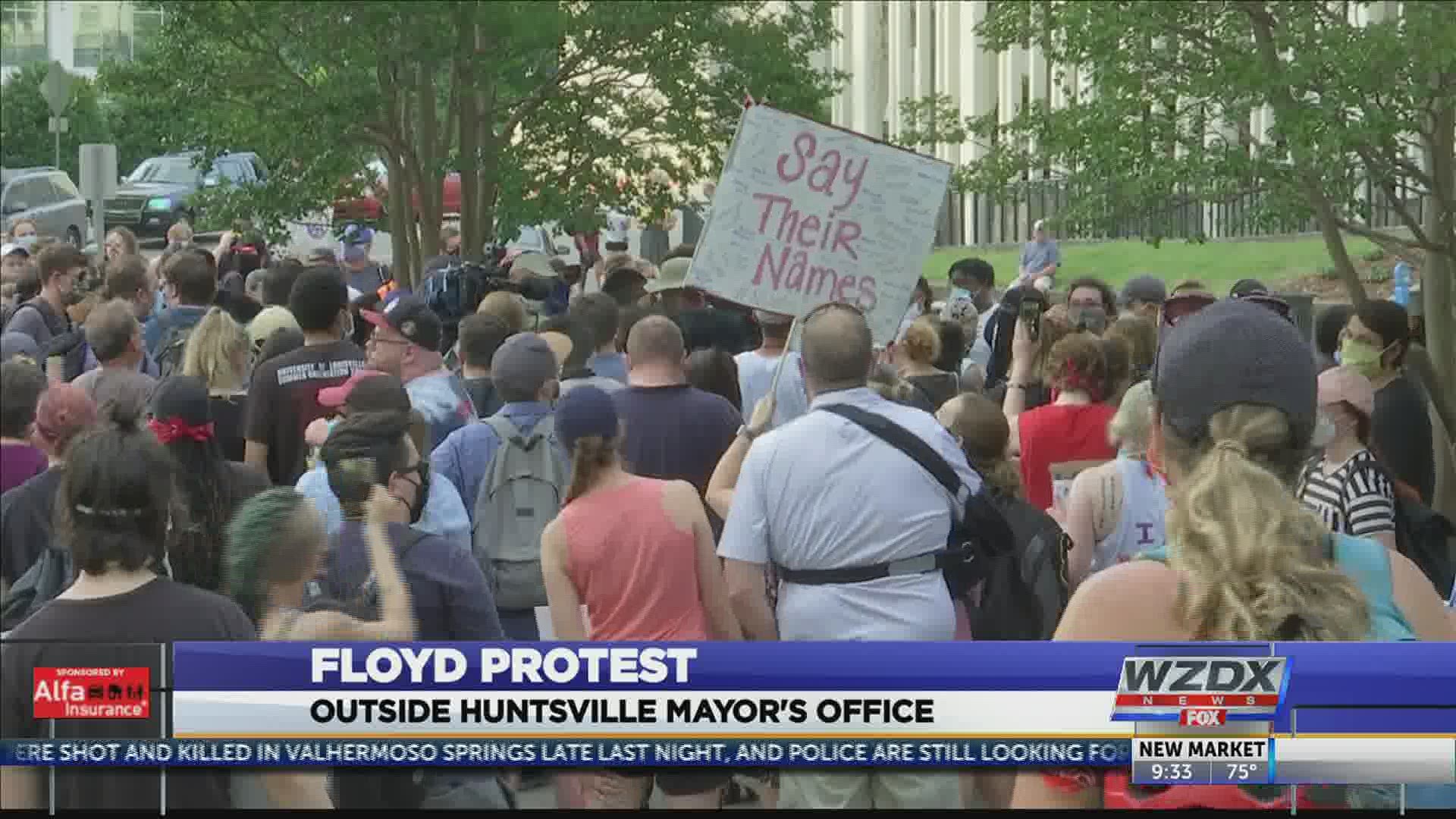 Protesters gathered peacefully in downtown Huntsville Friday evening.