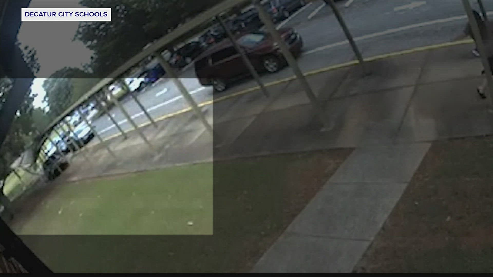 A car crashed into the canopy in front of Benjamin Davis Elementary during dismissal time Monday.