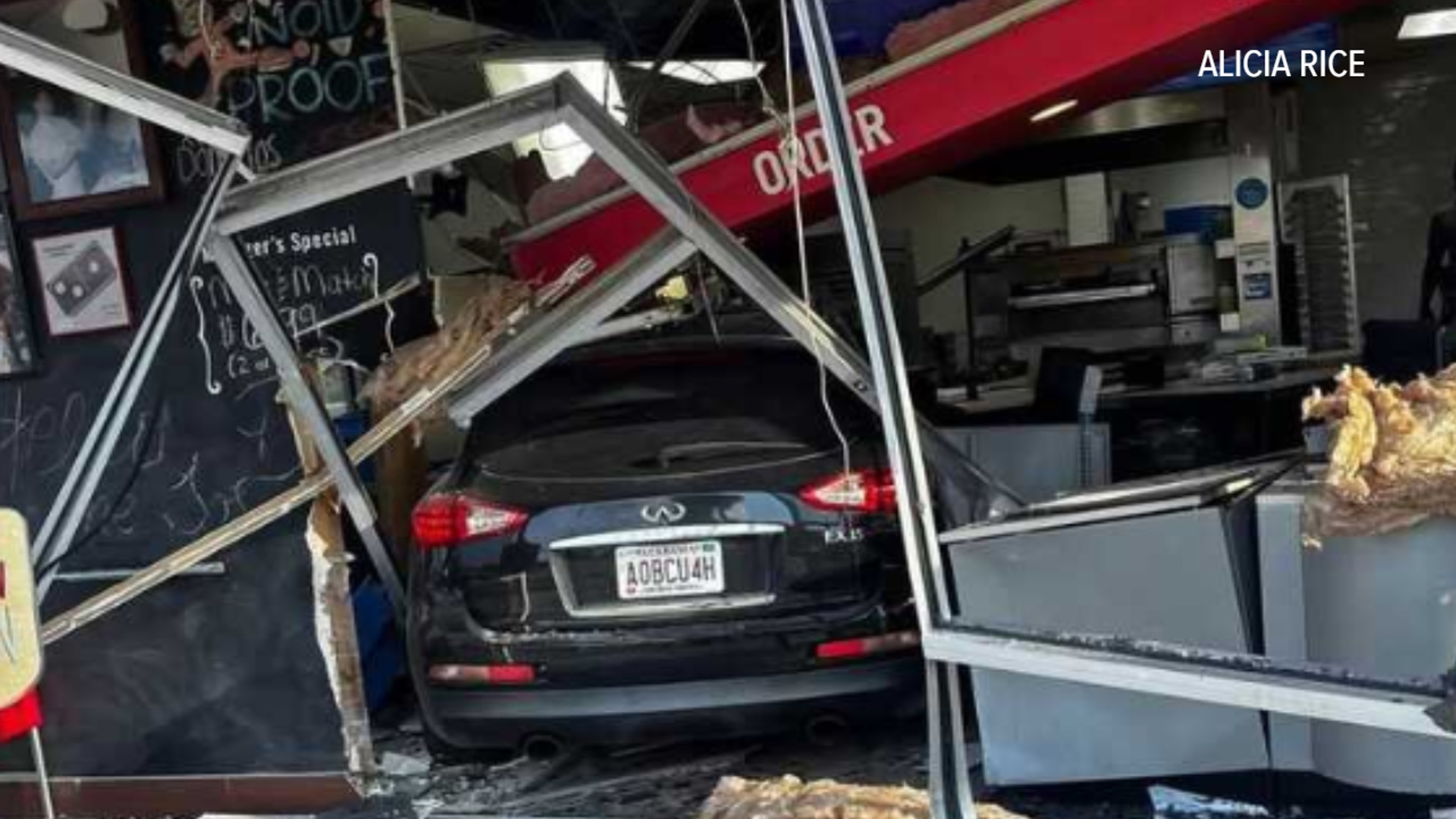 Damage at Domino's Mastin Lake after car crashes through store