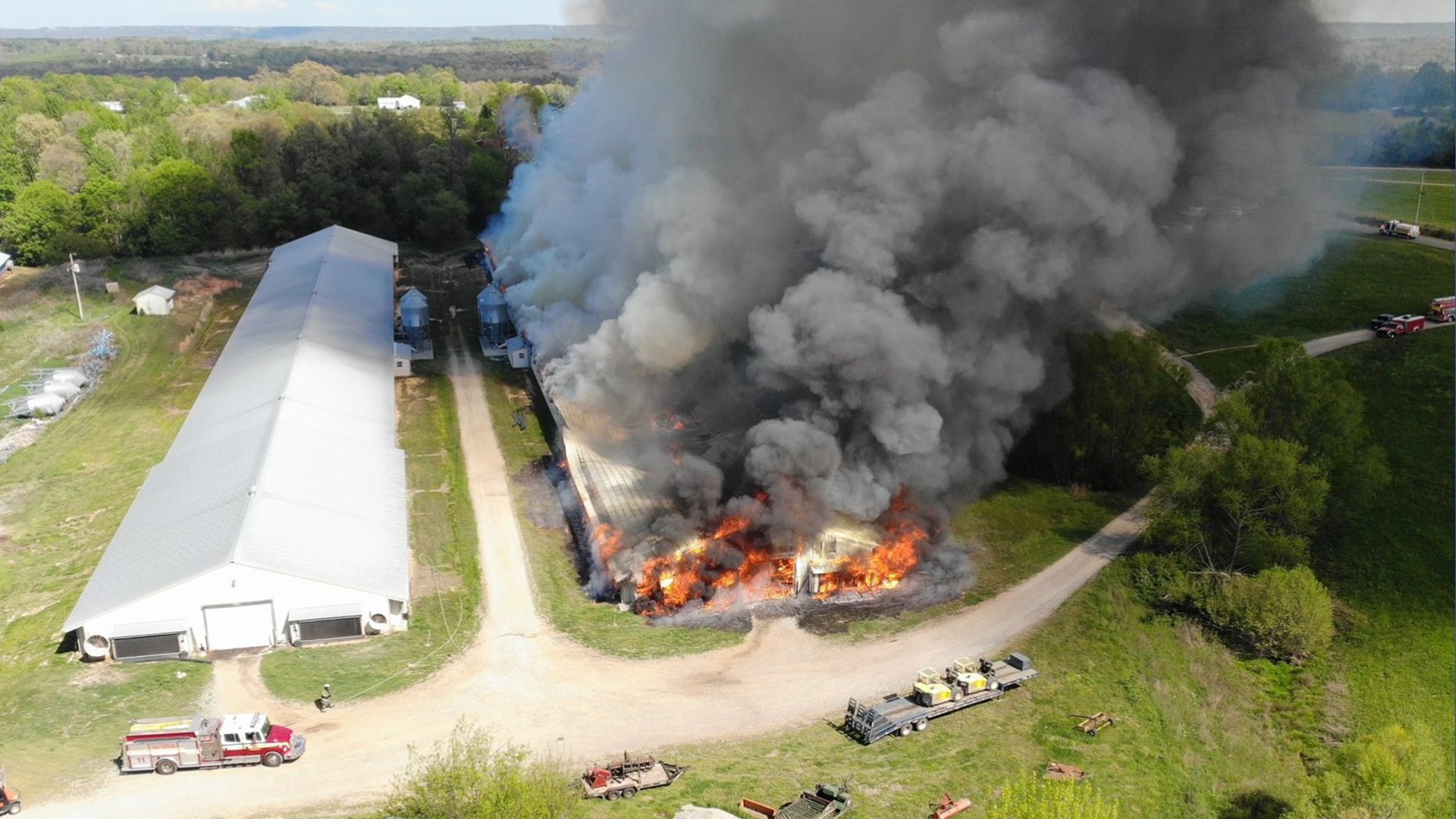 Massive response to Flat Rock chicken house fire as multiple agencies ...