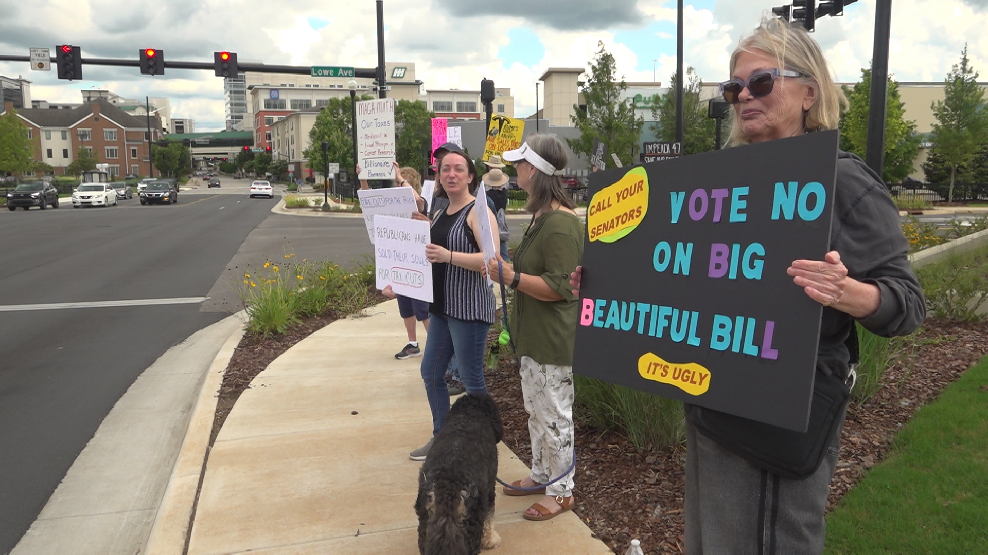 Protesters gathered in Huntsville Thursday to voice their concerns about the "Big Beautiful Bill."
