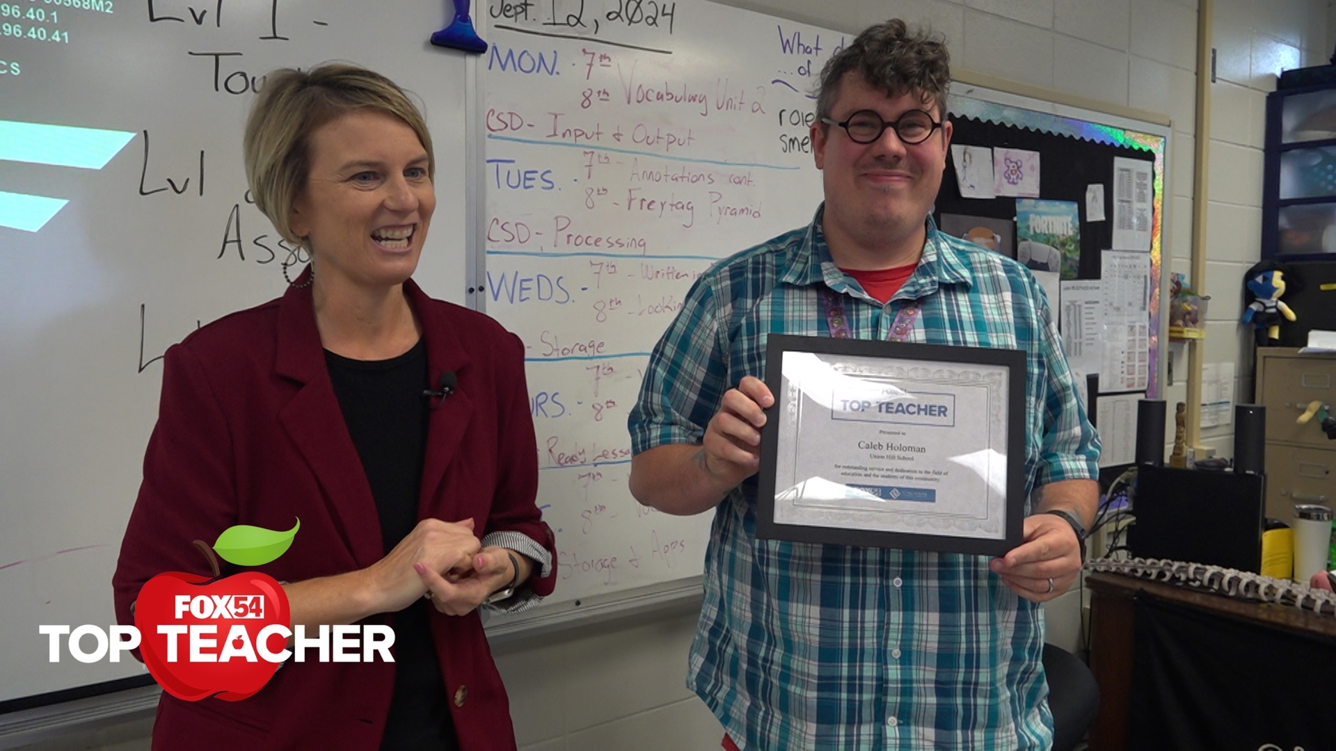 Caleb Holoman surprised as Top Teacher at Union Hill