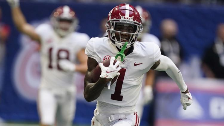 Alabama All-American wide receiver Jameson Williams was selected 12th by the Detroit Lions