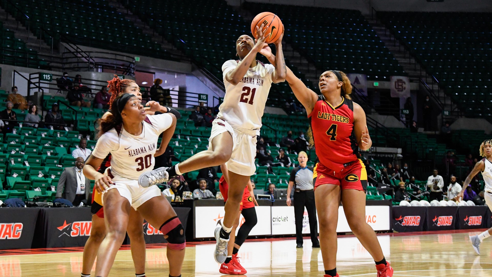 Dariauna Lewis scored a season-high 32 points and hauled in 10 boards as Alabama A&M dropped a 62-54 decision to Grambling in the SWAC Women's Tournament