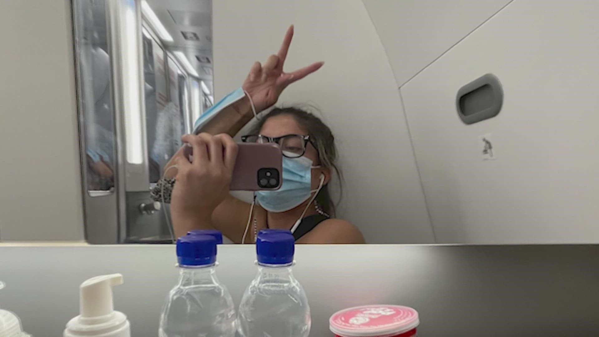 A video of a West Michigan woman in an airplane bathroom is now going viral.