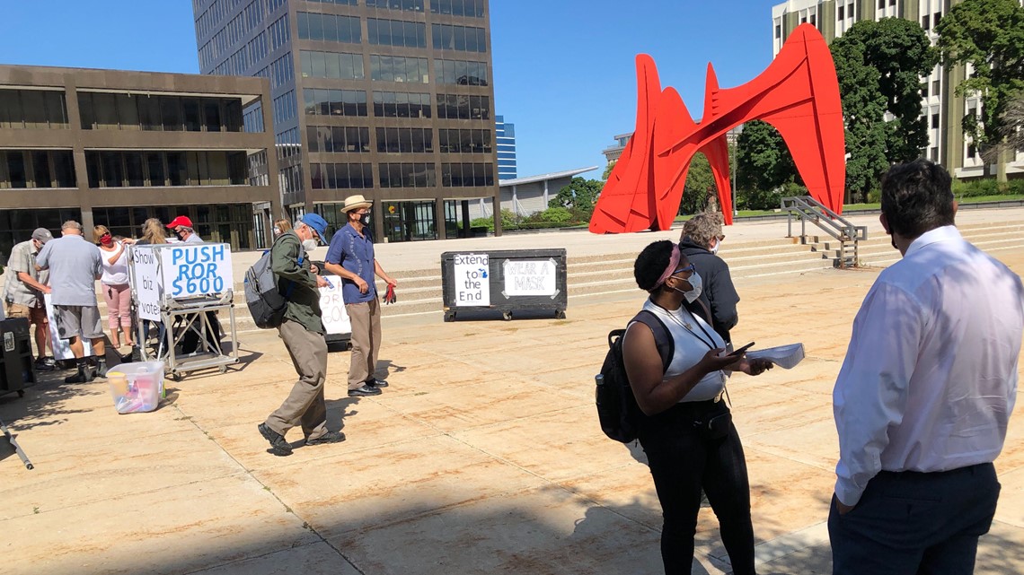 Gig workers protest for unemployment benefits in Grand ...