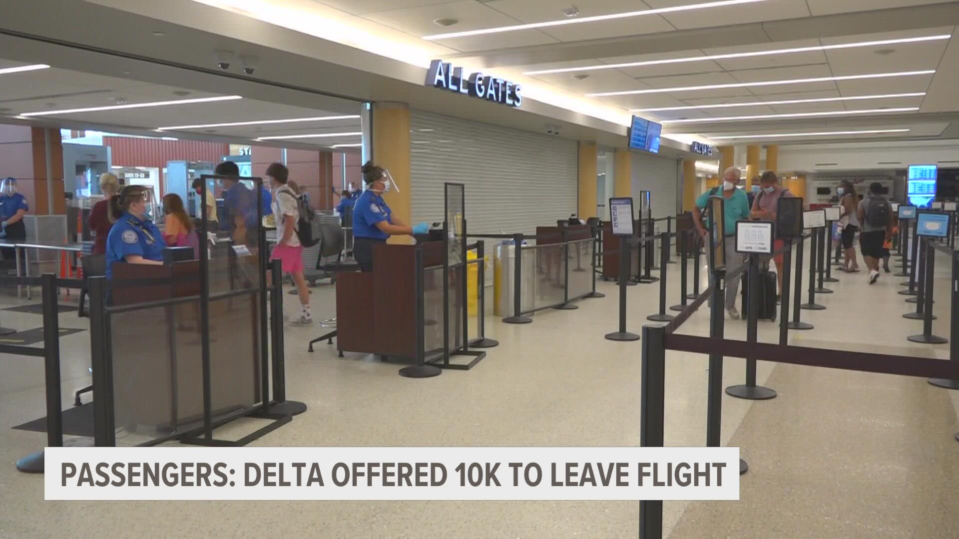 Several Delta passengers went to Twitter to talk about a $10,000 payout offered by the airline to bump them from an oversold flight from Grand Rapids to Minneapolis.