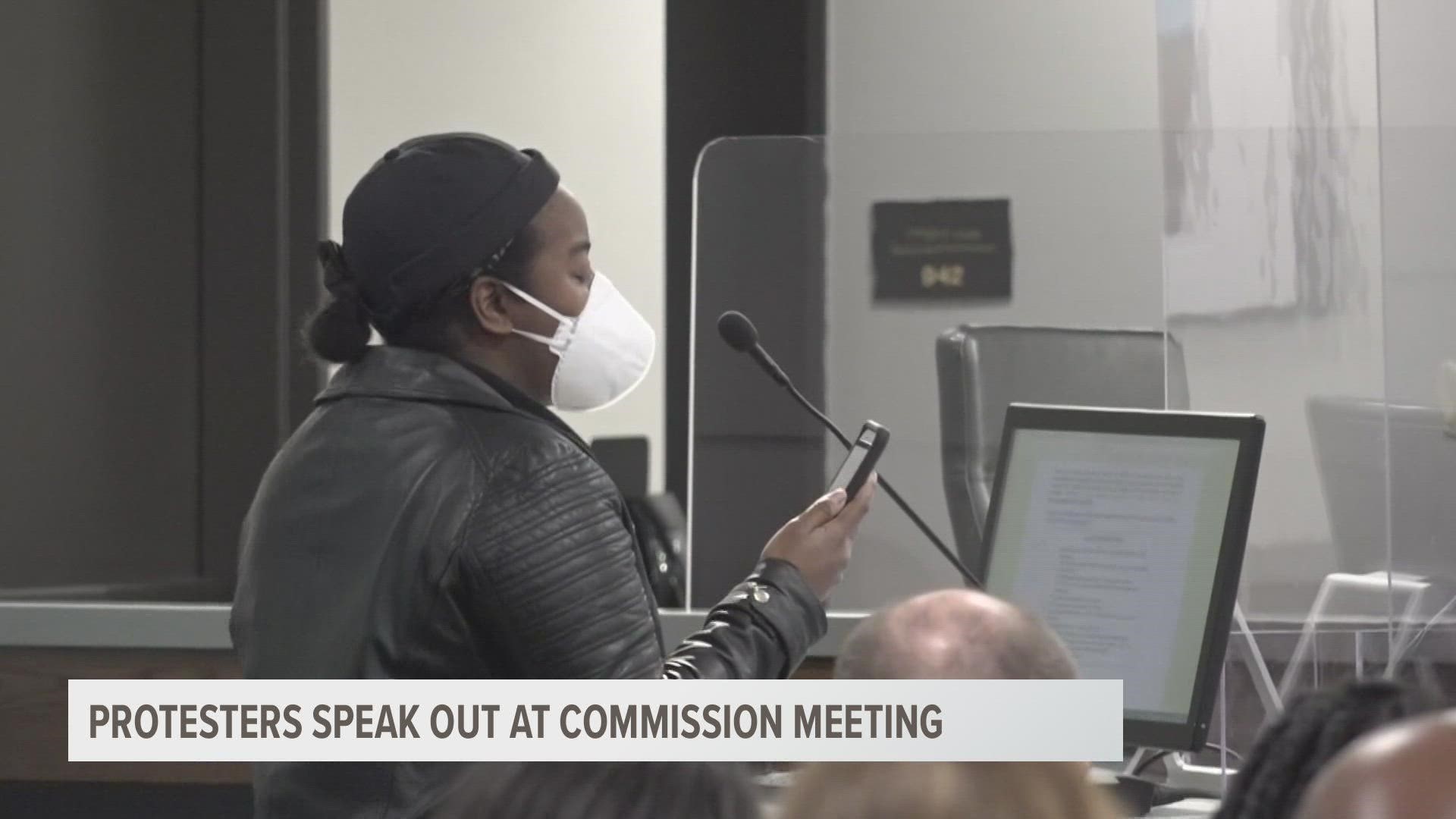 The community marched through downtown to the Grand Rapids City Commission meeting ahead of the anticipated video release of the police killing of Patrick Lyoya.